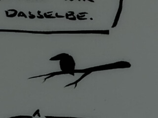 grossaufnahme eines der tusche-vögel.